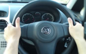 holding-the-steering-wheel-quatre-to-three